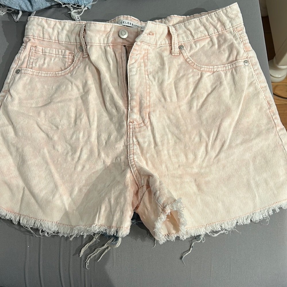 High waisted light pink jean shorts